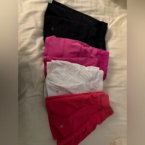Lululemon pace rival skirts 
Available in Black, Hot Pink, White, and Fuchsia